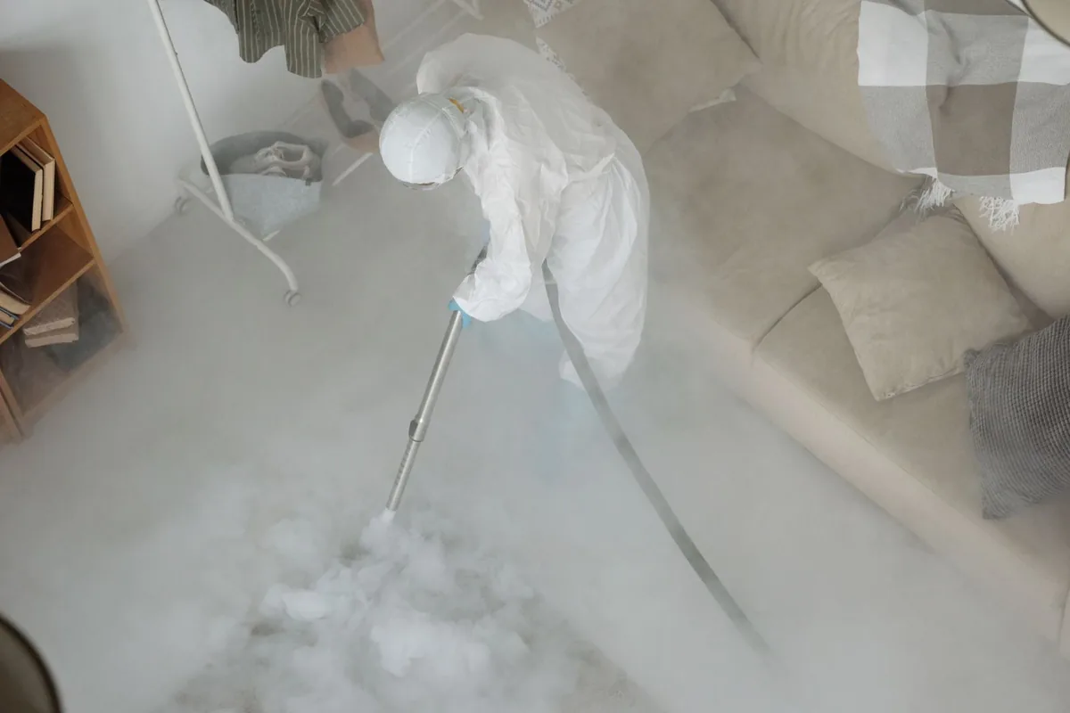 Biohazard cleanup technician in protective equipment, Lima, OH